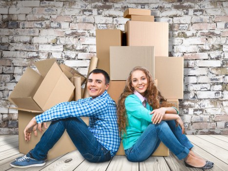 Professional movers handling boxes and furniture in Turnpike Lane