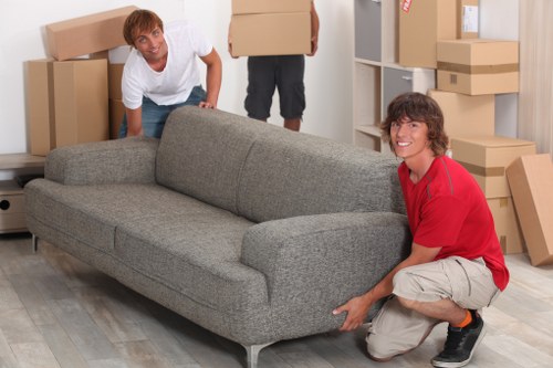 Moving day preparation with boxes and furniture ready for transport