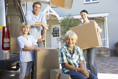 Local moving team handling furniture in Turnpike Lane