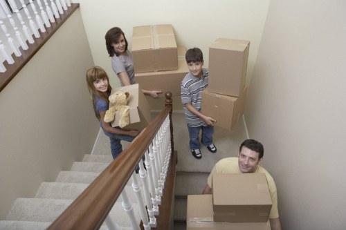 Moving crew using proper manual handling techniques during a job
